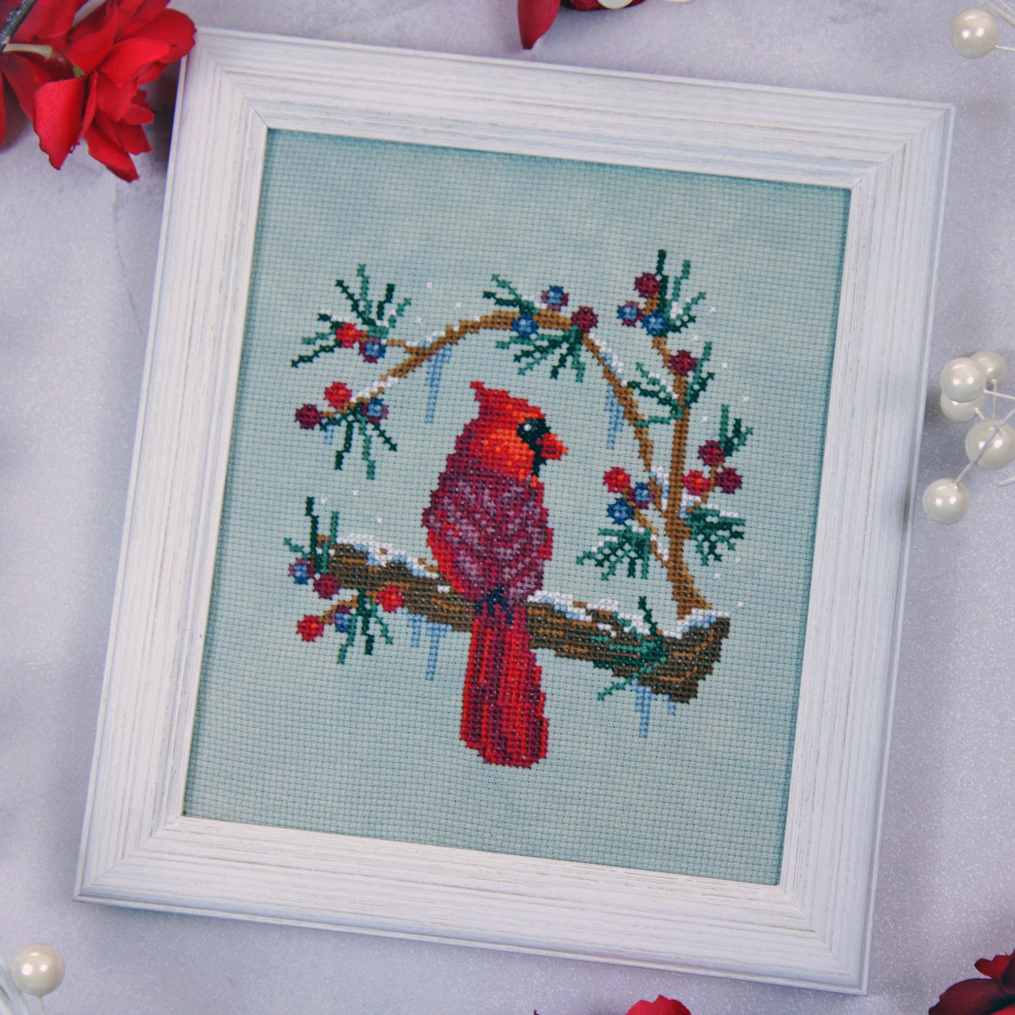 Winter’s Cardinal pattern by The Stitch Crypt