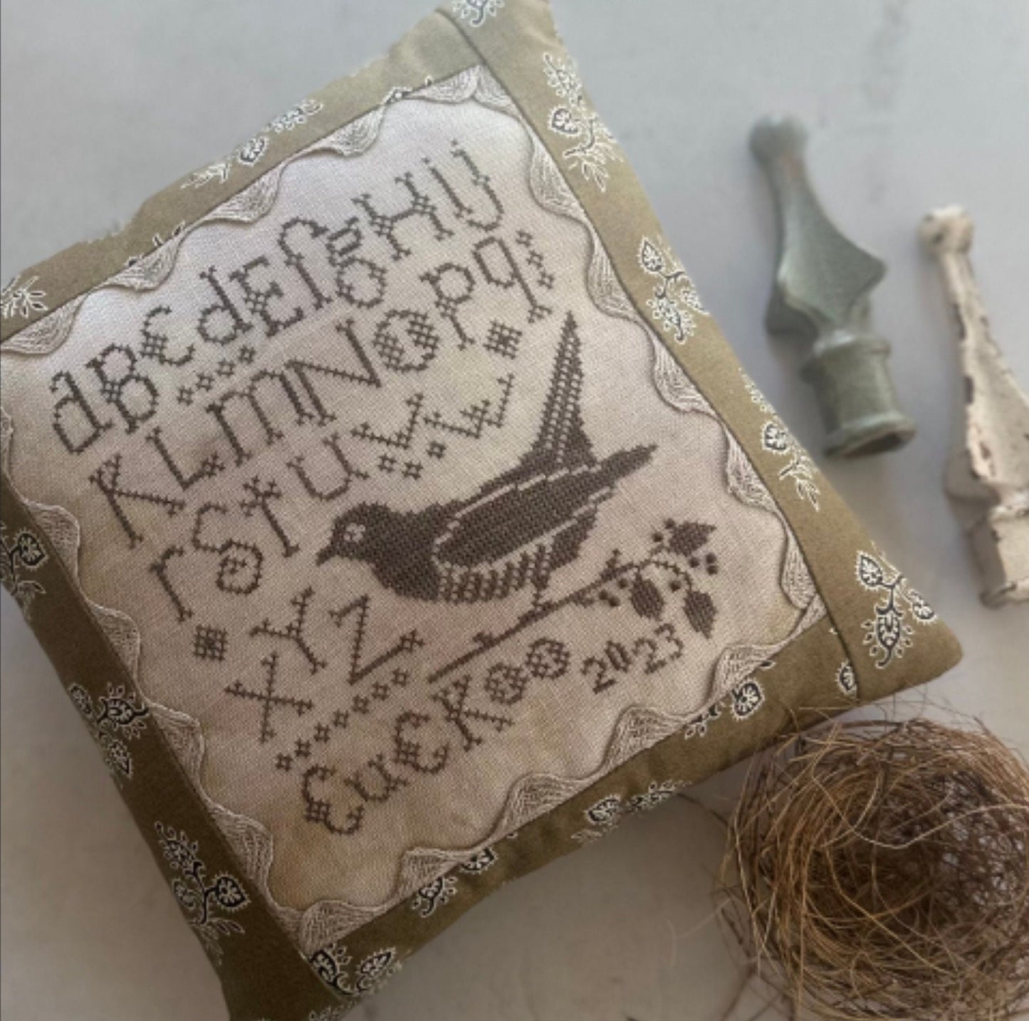 Cuckoo bird sampler pattern by Heart in Hand