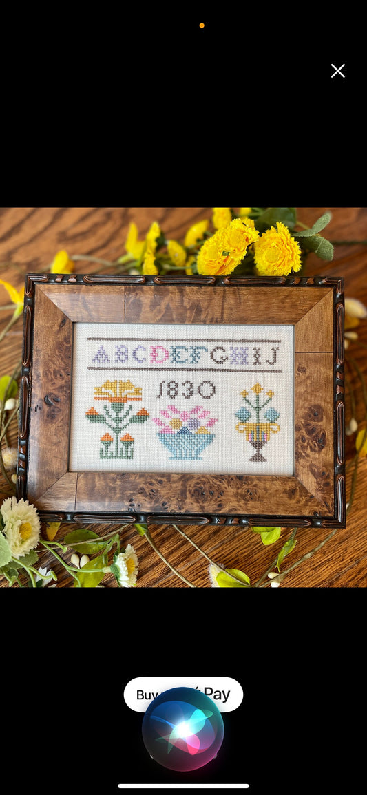 When Flowers Bloom 1839 sampler pattern by Annie Turner “The Proper Stitcher”